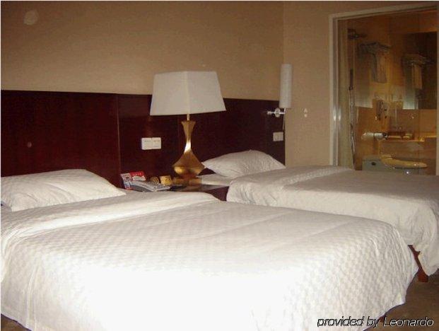 Bluesky Hotel Гуанчжоу Номер фото